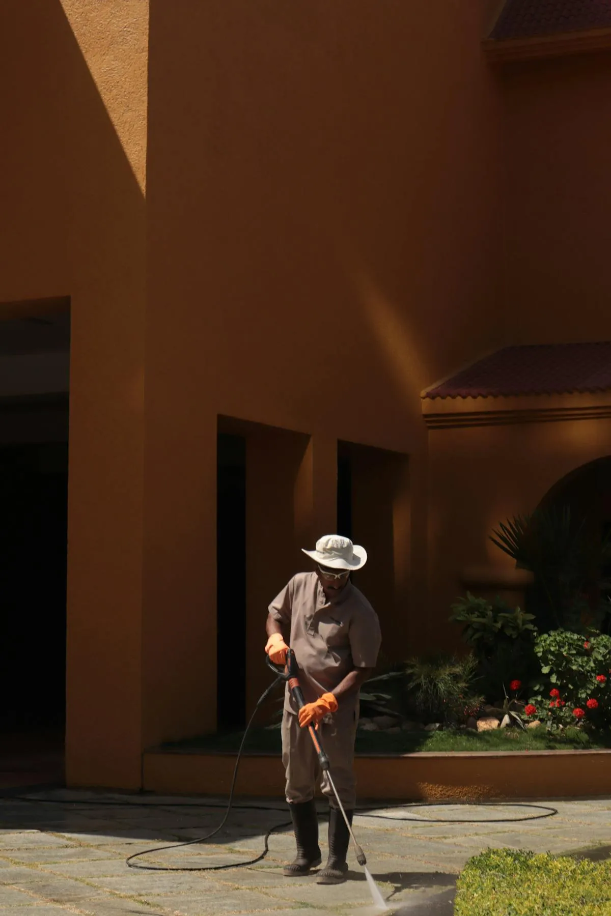 Pressure washing exterior surfaces